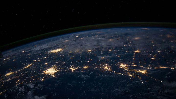 City lights across Earth at night seen from orbit